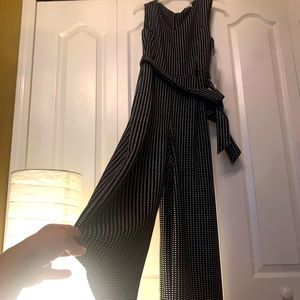 Jump suit.It’s black and white.